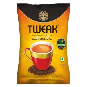 tweak tea pouch with Assam ctc leaf tea beside a tea cup in orange color